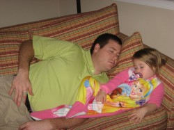 Daddy and Isabella fell asleep on the couch last night.  It was SO cute.  Look at her little legs:-)