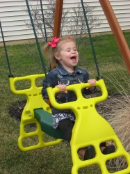 I can't decide if she likes the slide or the glider better.