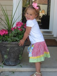 She was posing on her own.  She doesn't need any help!