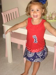The princess in her 4th of July outfit!  Oh, and her hair curled.