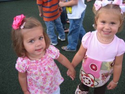 Isabella and her friend Alexa at the Tin Caps game.